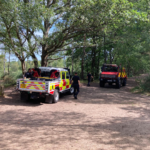 Photo of a Fire Service Land Rover and a Unimog (a huge off road fire fighting vehicle)