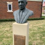 Photo of a bronze bust mounted on a plinth. Plaque says "Bob Potter - This area of land formerly owned by Reginald Herbert Frederick Potter has been made available for public enjoyment by his son Bob. January 2018"