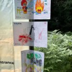 Photo of firefighting colouring sheets on display at a gazebo.
