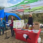 Staff members at Hazeley Heath for Heath Week 2025 promoting the magic of the heathland.